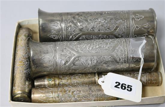 Six WWII naval shells decorated in the Indian style